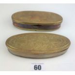 2 oval embossed brass tobacco boxes