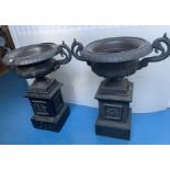Pair of cast iron garden urns