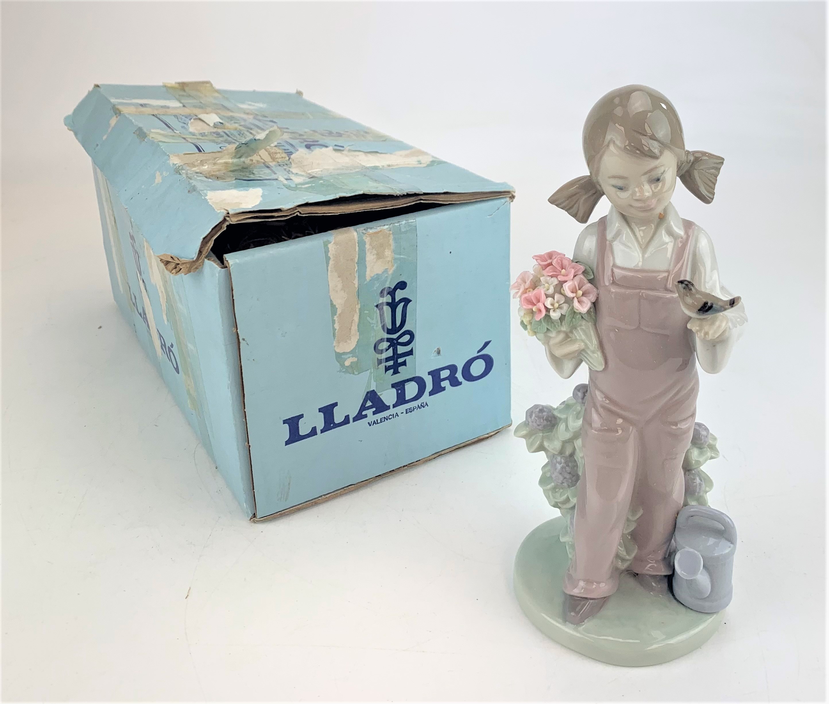 Lladro girl figure in box