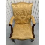 Antique silk upholstered armchair