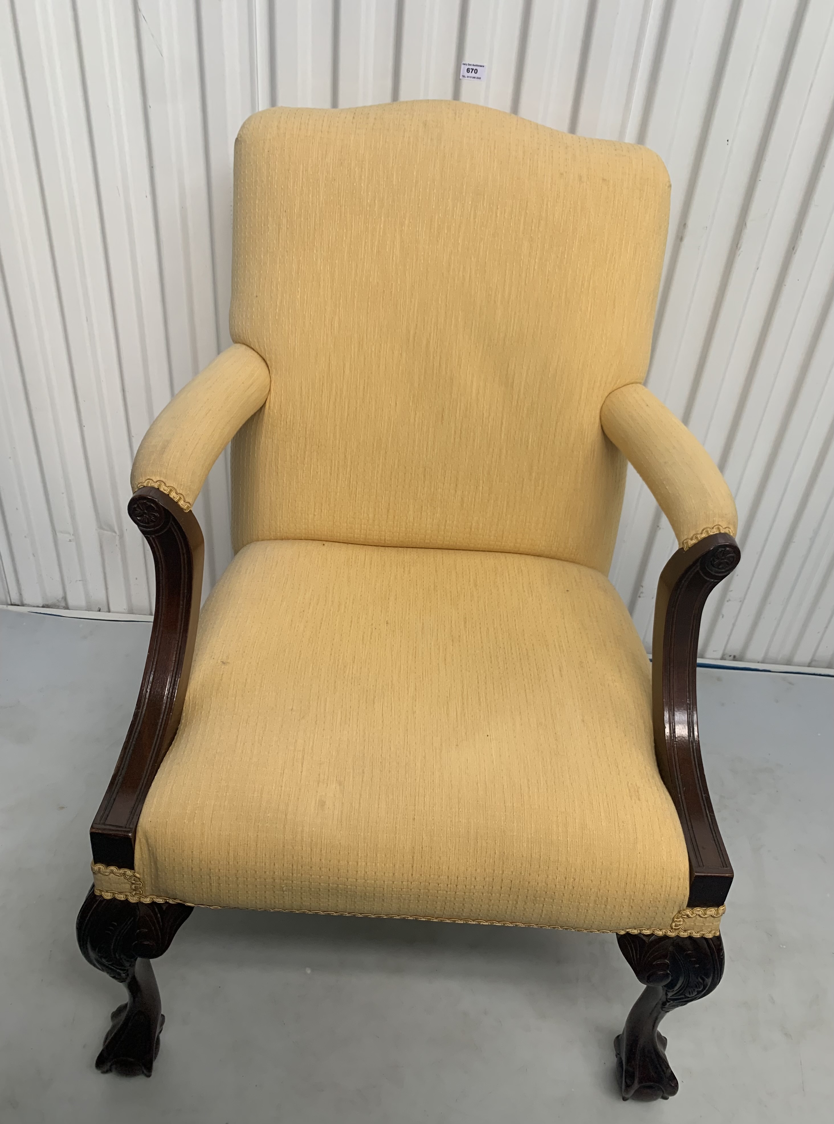 Antique upholstered armchair