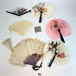 7 assorted fans and compact mirror