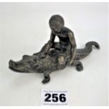 Bronze figure - boy on crocodile