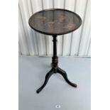Lacquered tripod table