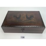 Carved wooden box with bird design