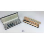 2 cased Parker pen and pencil sets