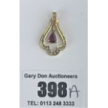 18k gold ruby and diamond pendant