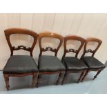 Set of 4 antique black seated chairs