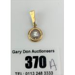 9k gold circular diamond pendant