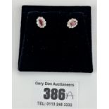 Pair of 9k gold ruby and diamond earrings