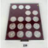 Leuchturm case with 17 assorted silver coins