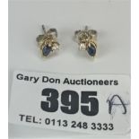 Pair of 18k gold sapphire and diamond stud earrings