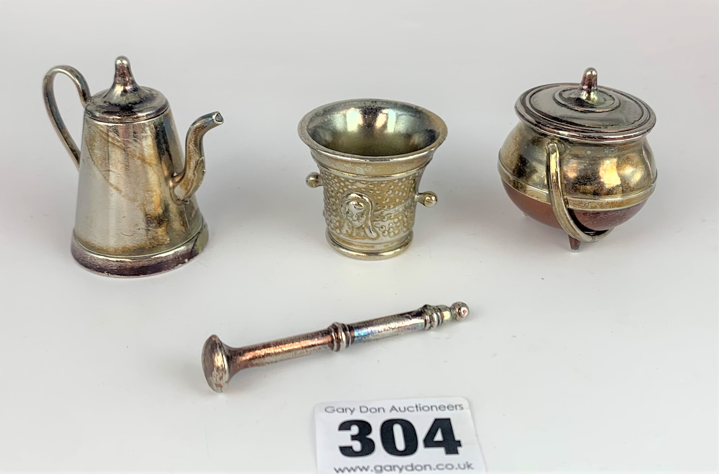 3 metal miniature items