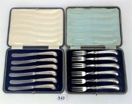 2 cased sets of silver handled cutlery