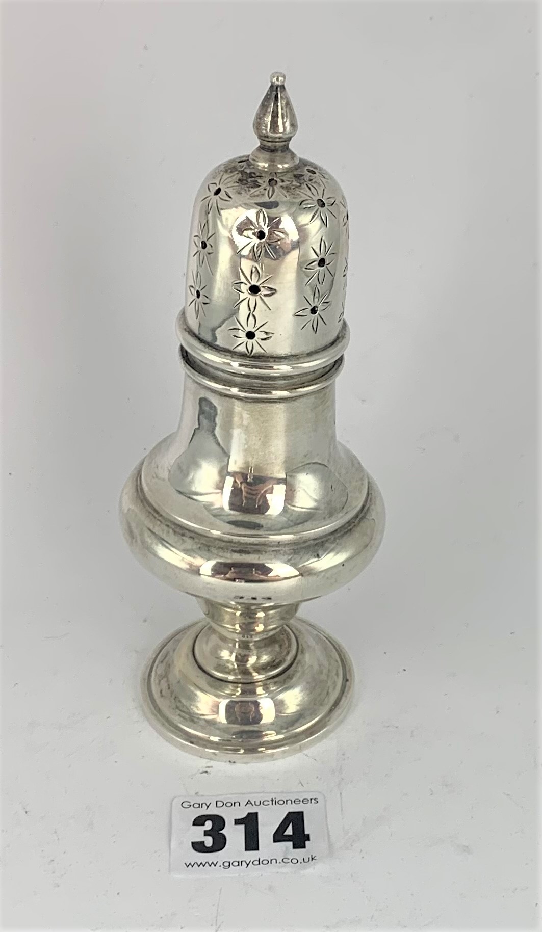 Silver sugar shaker