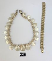 Shell necklace and plated bracelet