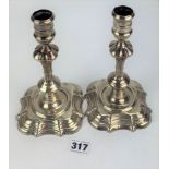 Pair of silver candlesticks