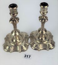 Pair of silver candlesticks