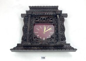 Carved wall clock