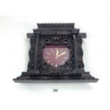 Carved wall clock