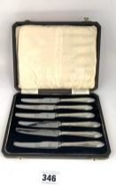 6 silver handled knives