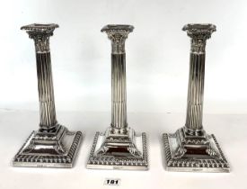 3 silver candlesticks