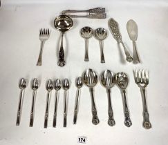 Assorted plated serving utensils