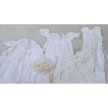 Four lace Christening gowns