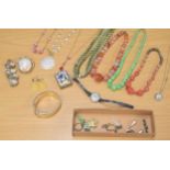 Small selection of costume jewellery to include a carnelian agate bead necklet, erotic brass and