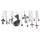 Karis stone and gem set cross pendant; together with two cat pendants with chains; two Karis gem set