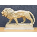 In the manner of Antoine Louis Barye (French 1795-1875) - marble figure of a lion upon a rectangular