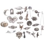 Assortment of various white metal brooches and stick pins (28)
