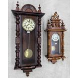 Vienna type two train spring driven wall clock, 44" high (with pendulum and winding key); together