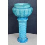 Large Burmantofts Faience pottery jardinière, in a turquoise glaze with stylised petal decoration,