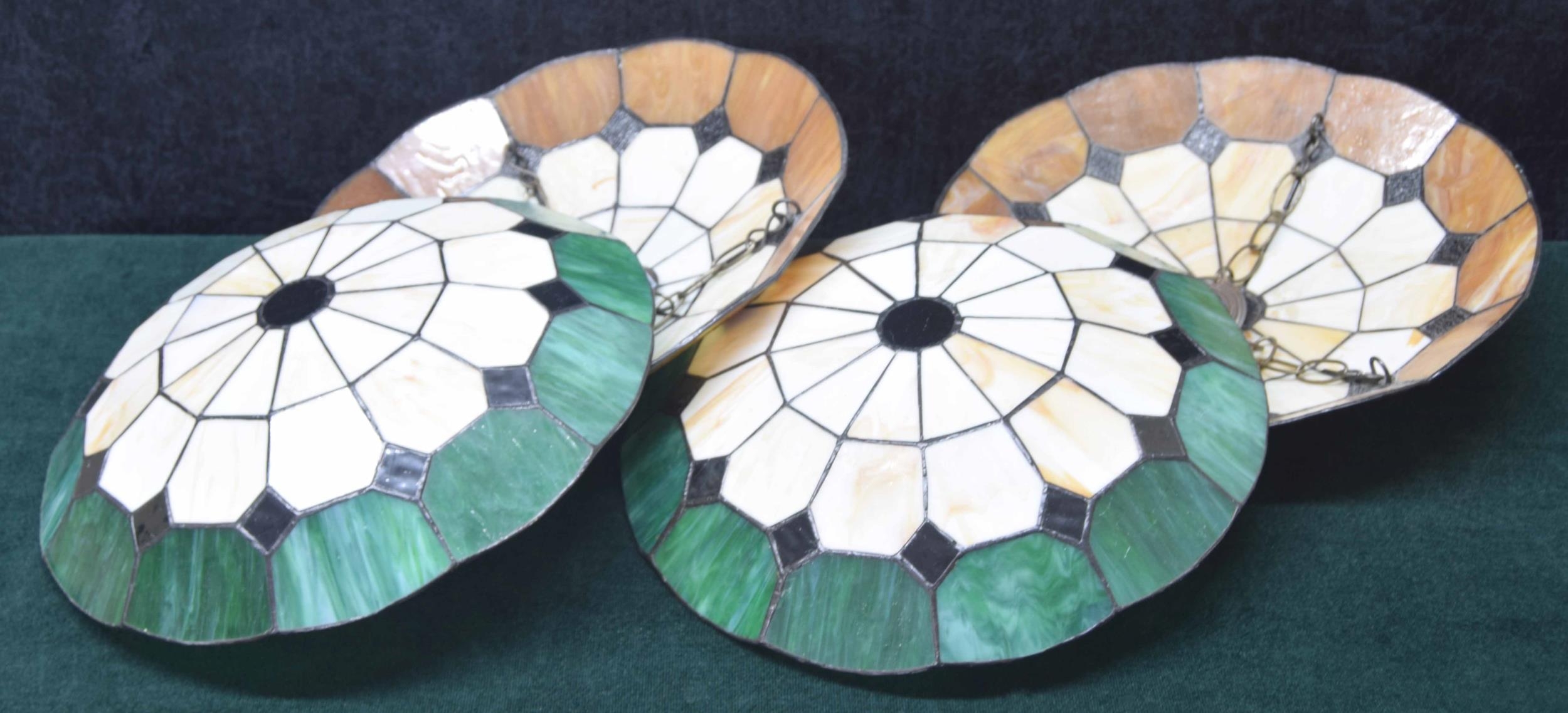 Two pairs of decorative Tiffany style glass ceiling light shades, two brown and two green, 14.5"