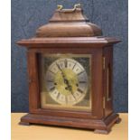 West Germany mahogany cased bracket clock, the 7.5" brass dial with silvered chapter ring and