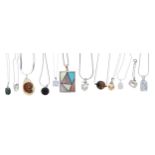 Collection of nine assorted silver mounted pendants upon silver chains; together with a Swarovski