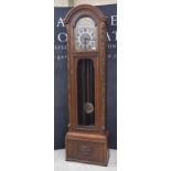 Early 20th century oak grandfather clock, the arched silver dial with pierced brass spandrels over a