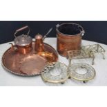 Large circular copper tray, 24" diameter; together with a copper bucket, two brass plant stands on