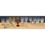 Collection of 19th century liqueur glasses, most with etched vine decoration, including three yellow