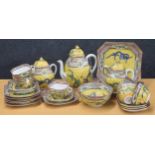 Chinese porcelain tea set decorated with dragons on a yellow ground, 20th century