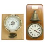 Contemporary electric ship's bulkhead wall clock with passing strike on a bell above, the 6" cream