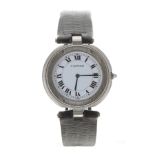 Cartier Santos stainless steel wristwatch, circular white dial with Roman numerals, secret signature