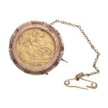 Edward VII 1908 half sovereign coin in a 9ct brooch mount, with safety chain, 6.3gm, 25mm dimeter