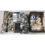 Large quantity of assorted watch and clock parts and spares to include stems, staffs, jewels,