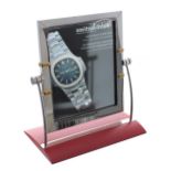 Omega counter display mirror, with signed red base and the mirror signed verso, 10.5'' high, 10''