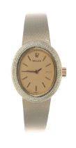 Rolex 14ct oval lady's wristwatch, import hallmarks London 1979, reference no. 1024, serial no.