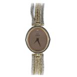 Omega 18ct bi-colour oval lady's wristwatch, reference no. 1387, oval champagne striped dial with