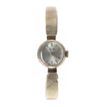 J.W. Benson 9ct lady's wristwatch, Edinburgh 1965, silvered dial, 17 jewel, case with presentation