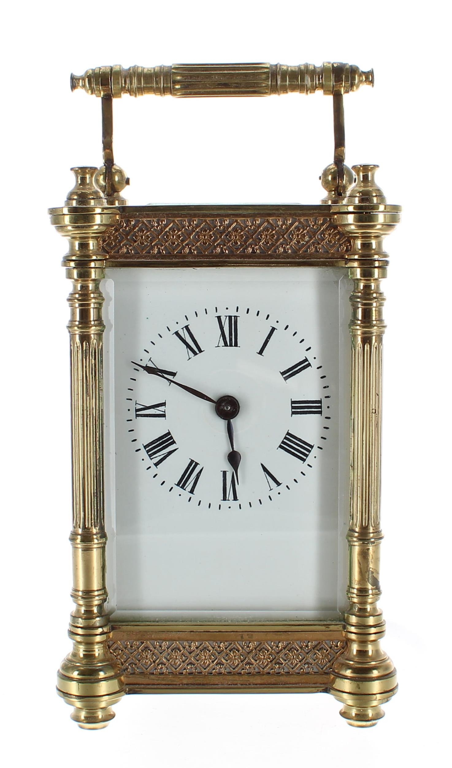 Carriage clock timepiece, within a fancy filigree banded and pillared case, 6.25" high (key)